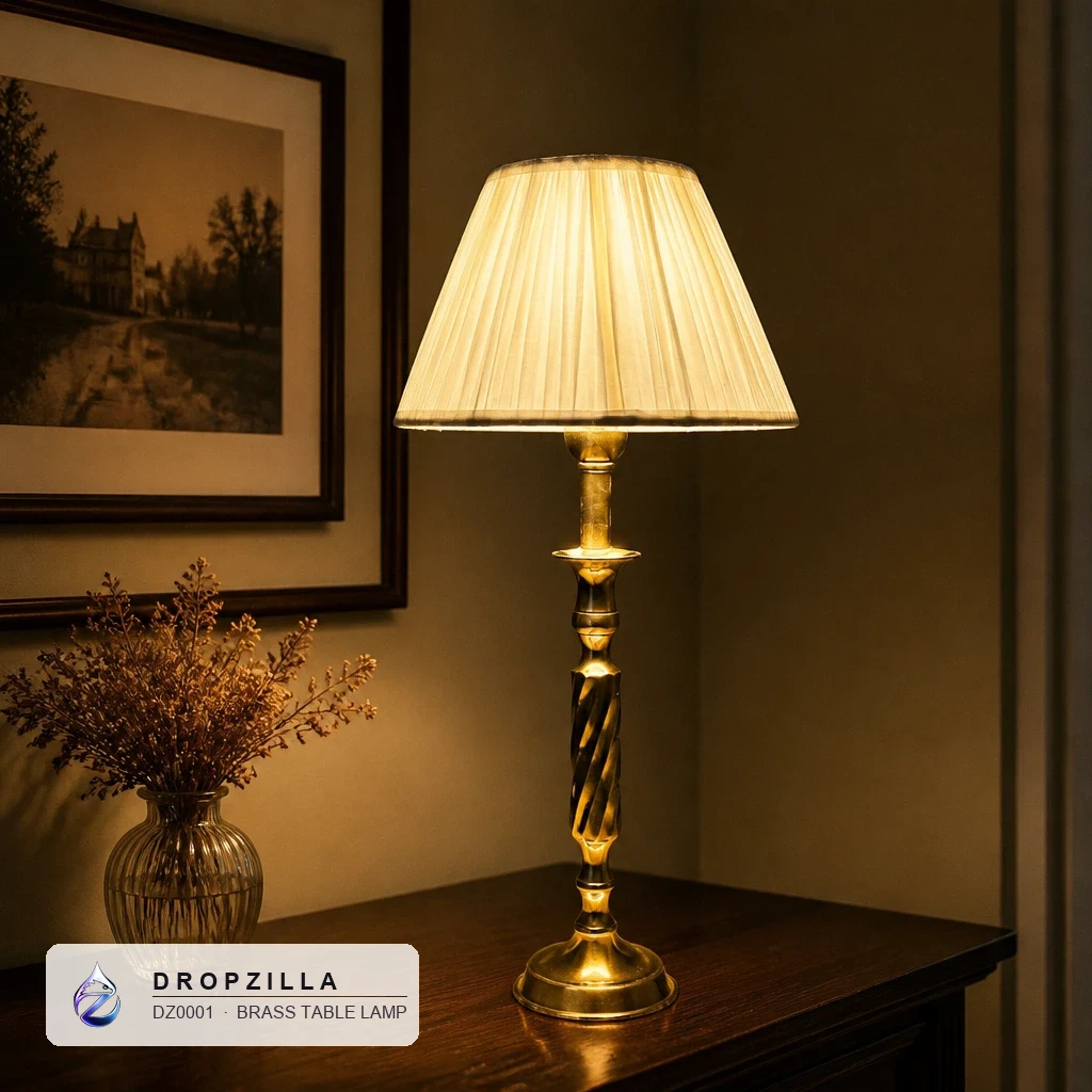 A warmly lit Dropzilla lamp glowing on a console at home