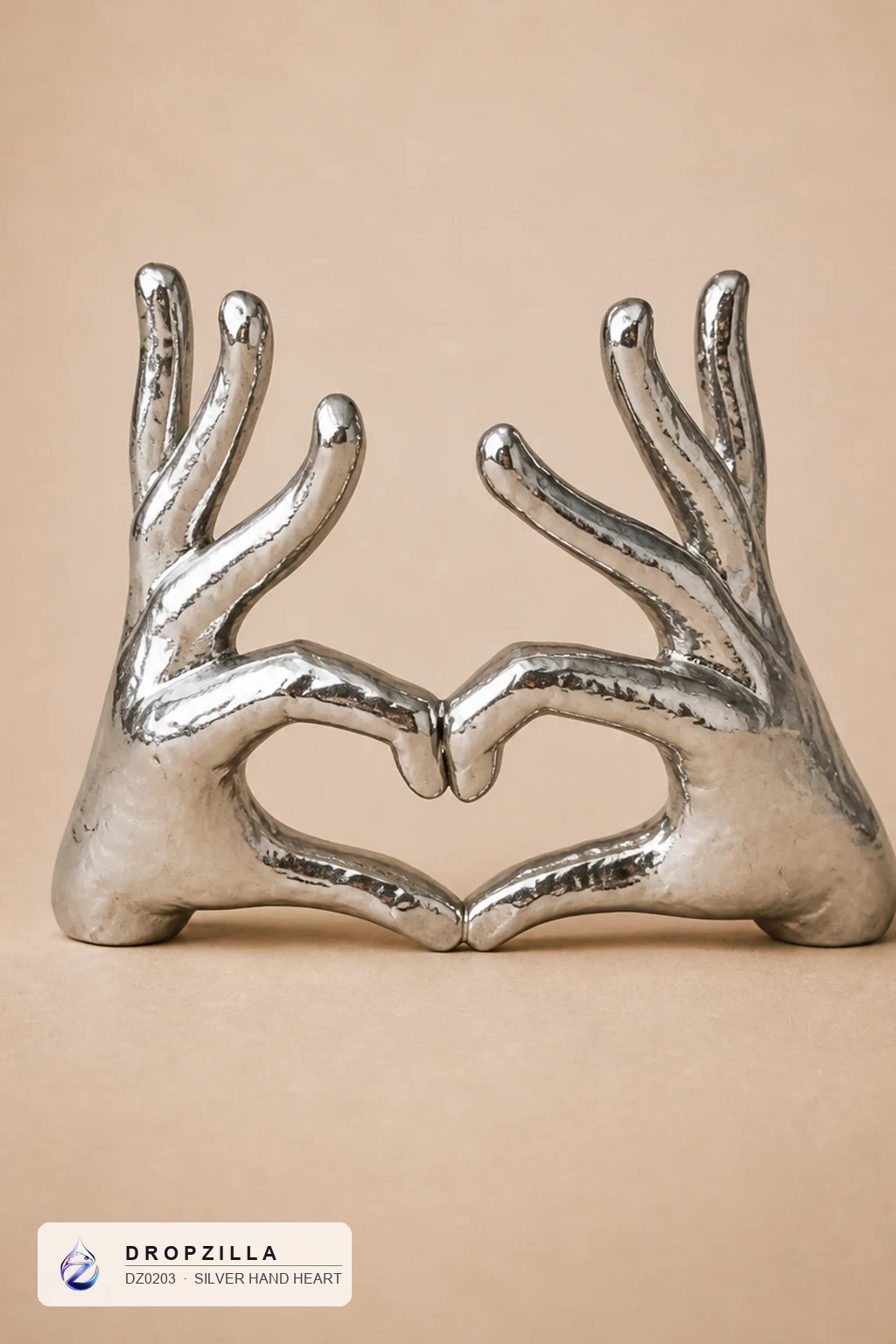 Silver Hand Heart — Home Decor — Cast aluminium with a polished silver finish — Dropzilla